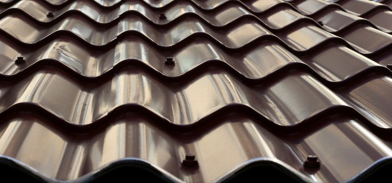 Dark metal roof tiles