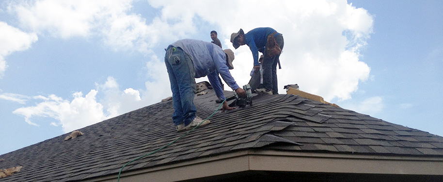 Roofers Installing Shingles